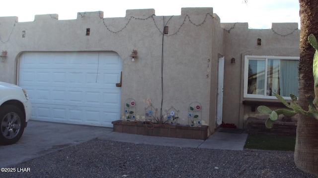 view of side of home with a garage