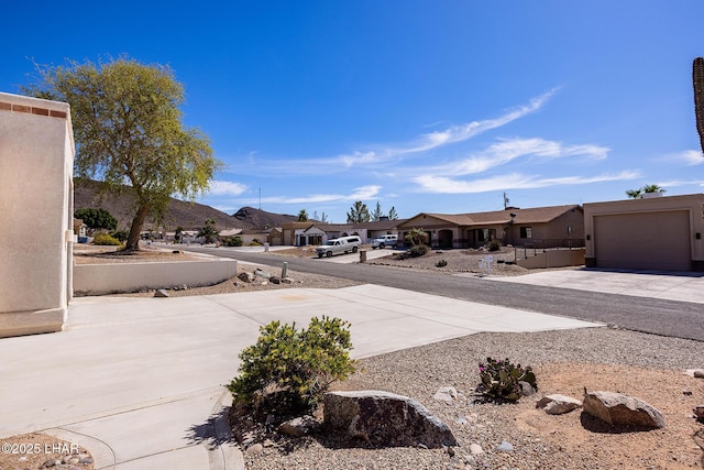 view of road featuring a residential view