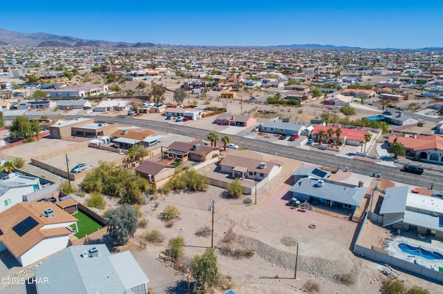 bird's eye view featuring a mountain view and a residential view