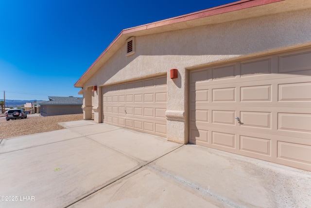 garage with driveway