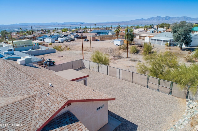 birds eye view of property featuring a mountain view and a residential view