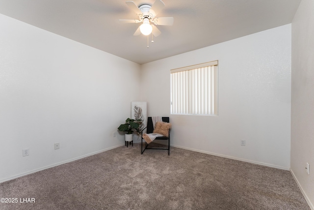 unfurnished room with baseboards, carpet, and a ceiling fan