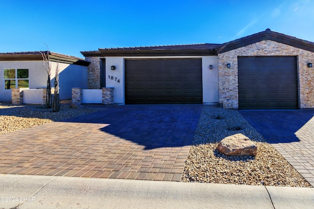 view of front of home featuring a garage