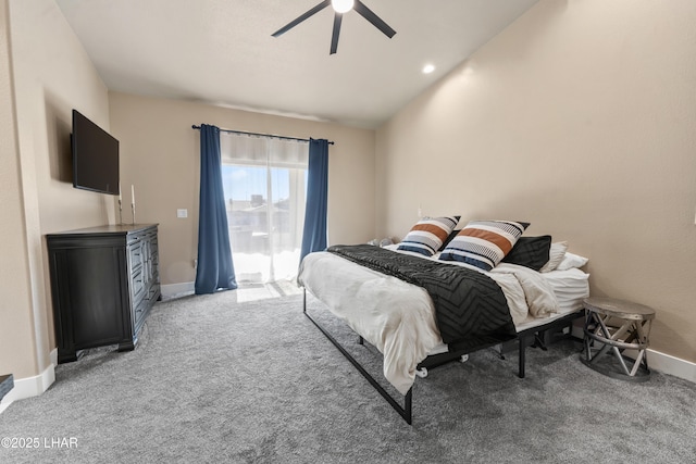 carpeted bedroom featuring vaulted ceiling and ceiling fan