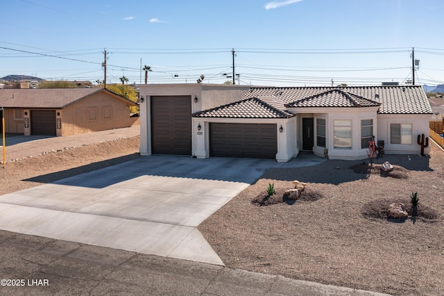 view of front of home with a garage