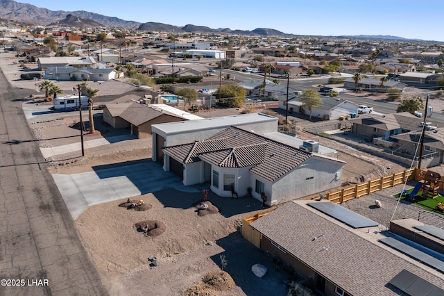 drone / aerial view featuring a mountain view