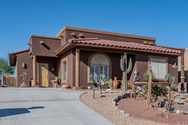 1972 E Bayshore Rd, Lake Havasu City, AZ 86404 - view of front facade with stucco siding and a tile roof