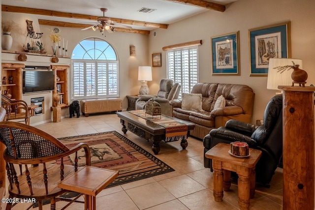 1972 E Bayshore Rd, Lake Havasu City, AZ 86404 - living area with beamed ceiling, light tile patterned flooring, visible vents, and ceiling fan