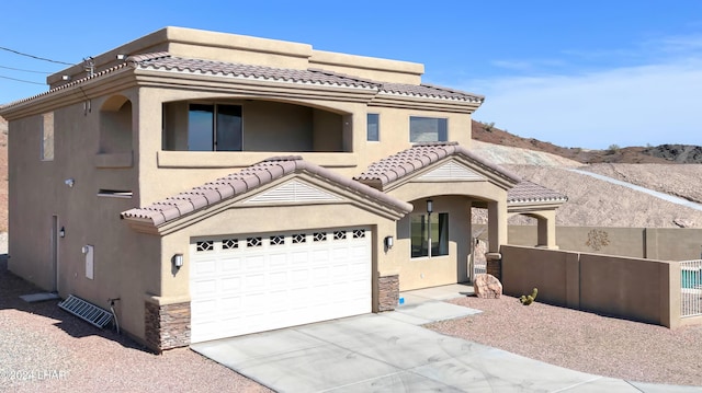 view of front of home with a garage