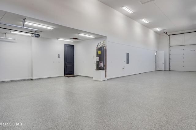 garage with water heater, baseboards, and a garage door opener