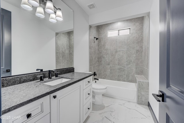 bathroom featuring visible vents, toilet, marble finish floor, tub / shower combination, and vanity