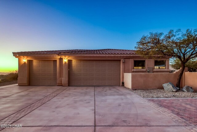 view of front of house with a garage