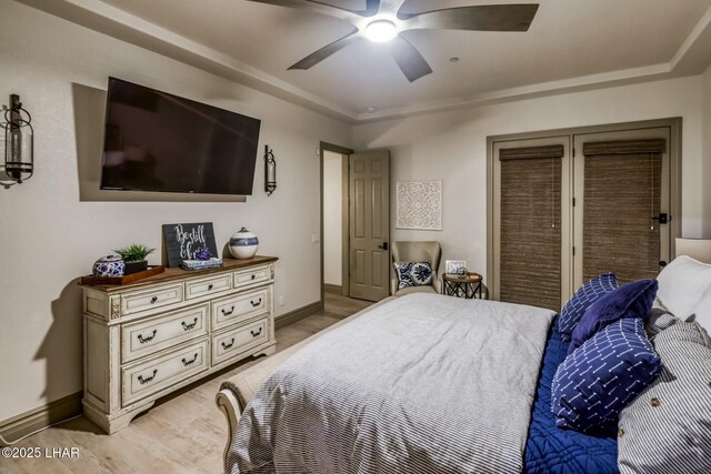 bedroom featuring ceiling fan and light wood-type flooring