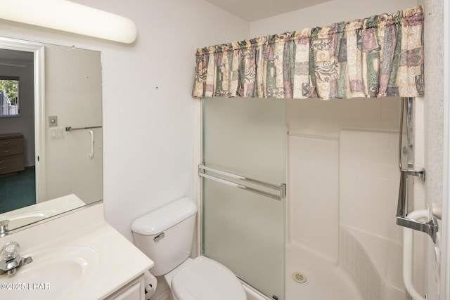 4080 Albacore Dr, Lake Havasu City, AZ 86406 - bathroom featuring a stall shower, vanity, and toilet