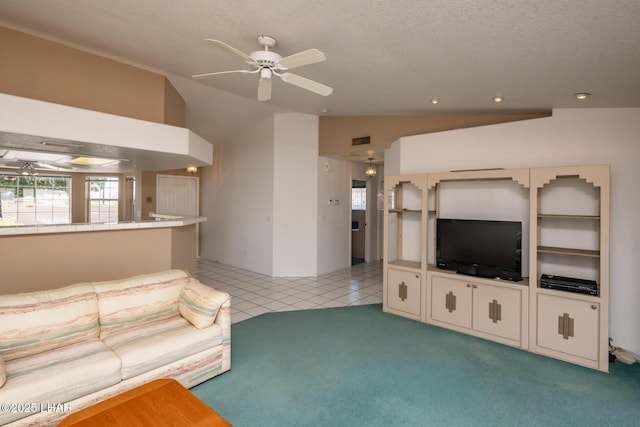 4080 Albacore Dr, Lake Havasu City, AZ 86406 - unfurnished living room featuring vaulted ceiling, a ceiling fan, carpet flooring, tile patterned floors, and recessed lighting