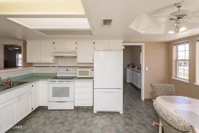 4080 Albacore Dr, Lake Havasu City, AZ 86406 - kitchen featuring white appliances, a ceiling fan, and white cabinets