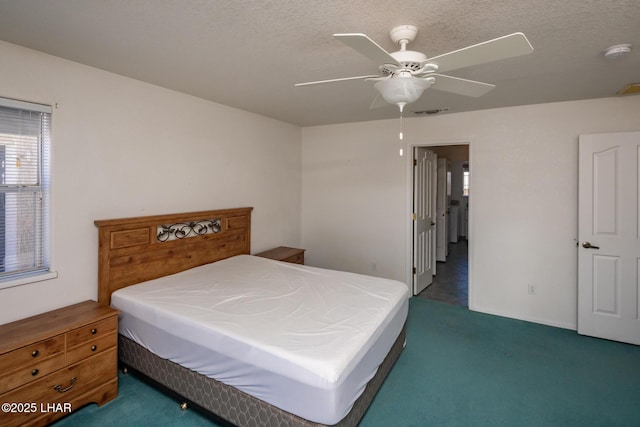 4080 Albacore Dr, Lake Havasu City, AZ 86406 - bedroom with carpet flooring, a textured ceiling, and a ceiling fan