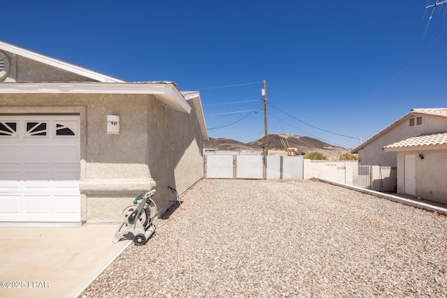 4080 Albacore Dr, Lake Havasu City, AZ 86406 - view of yard featuring a garage