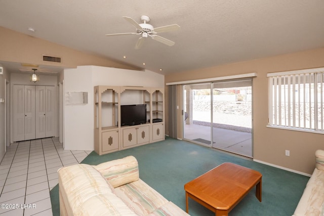 4080 Albacore Dr, Lake Havasu City, AZ 86406 - living area with lofted ceiling, a ceiling fan, and light carpet