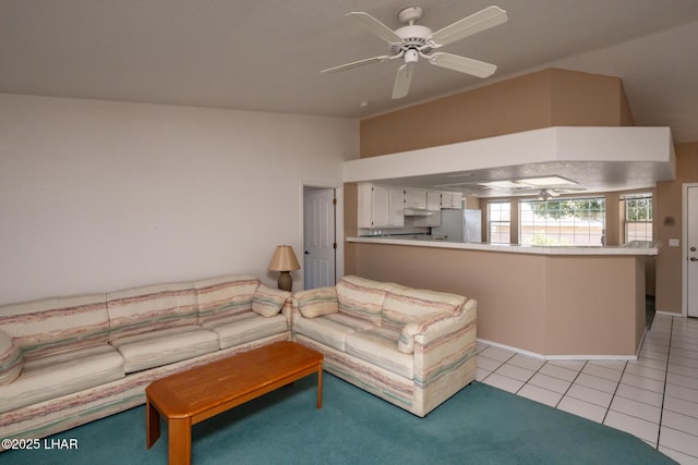 4080 Albacore Dr, Lake Havasu City, AZ 86406 - living room with ceiling fan, lofted ceiling, and light tile patterned floors