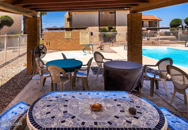 view of patio / terrace with a community pool