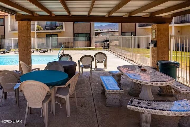 view of patio with a community pool