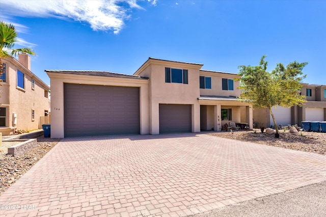 view of front of home with a garage