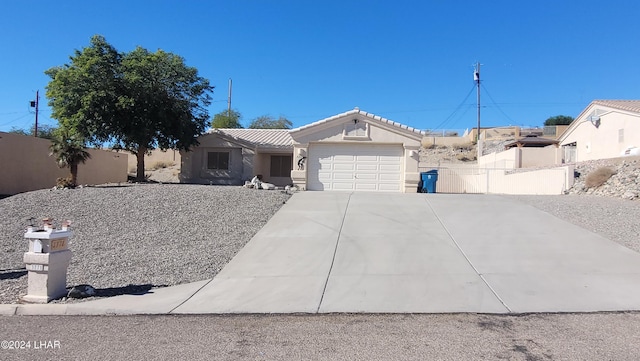 ranch-style house with a garage