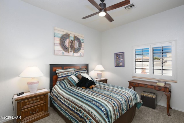 bedroom featuring ceiling fan, carpet, and visible vents