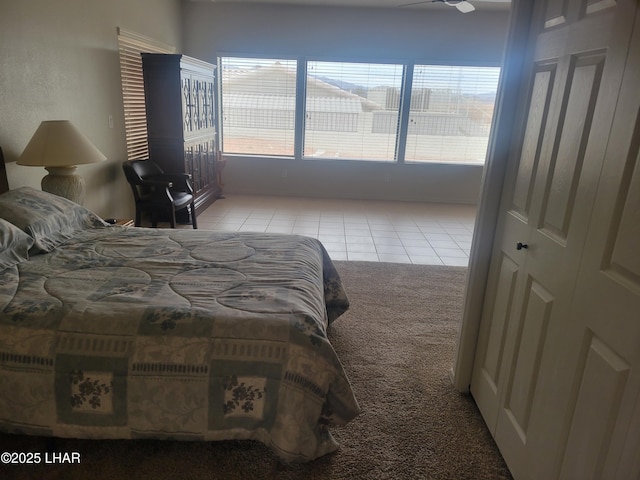 tiled bedroom with carpet