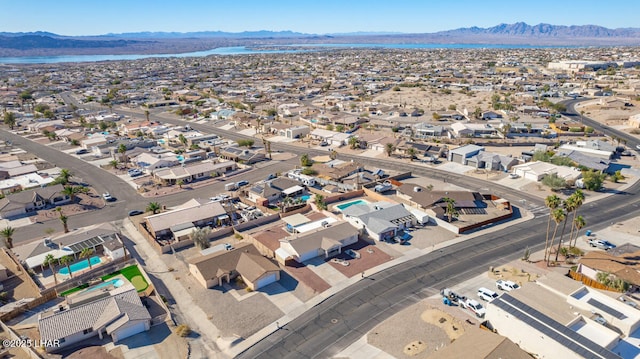 drone / aerial view featuring a mountain view