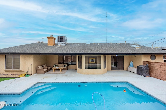 back of house featuring a shingled roof, an outdoor living space, stucco siding, an outdoor pool, and a patio area