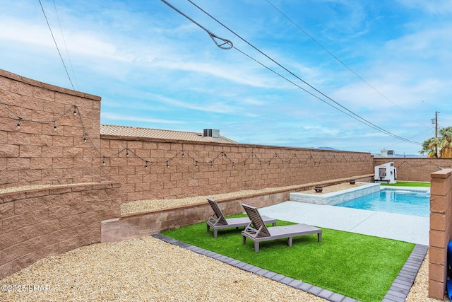 view of yard with a fenced backyard and a fenced in pool