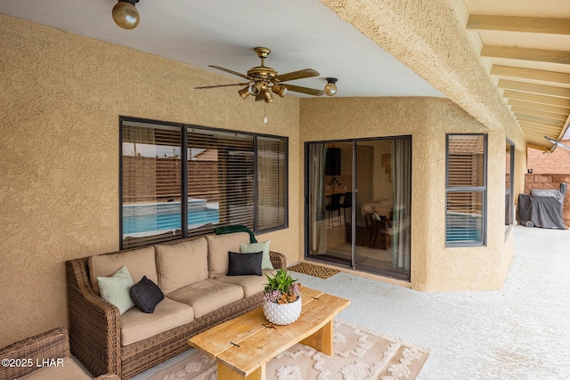 view of patio / terrace with ceiling fan and an outdoor hangout area