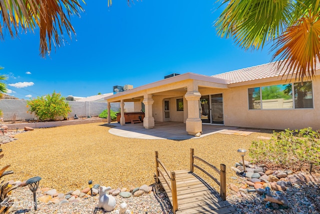 2335 Palo Verde Blvd N, Lake Havasu City, AZ 86404 - back of property featuring stucco siding, fence, a patio, and a tiled roof