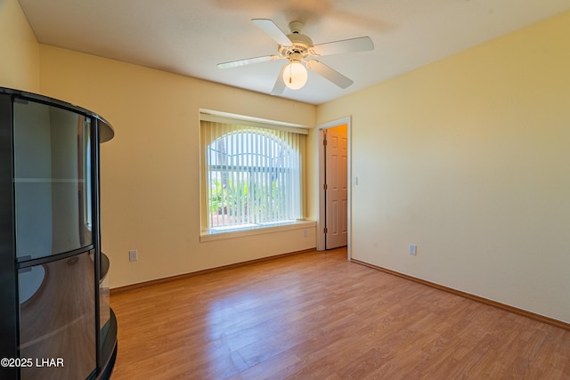 2335 Palo Verde Blvd N, Lake Havasu City, AZ 86404 - spare room with light wood finished floors, baseboards, and ceiling fan