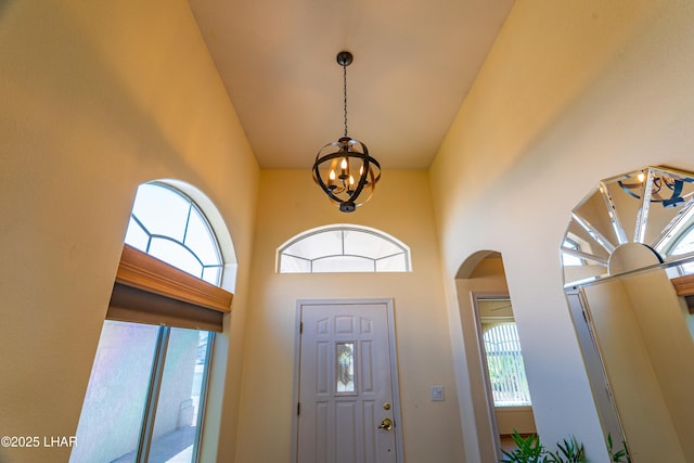 2335 Palo Verde Blvd N, Lake Havasu City, AZ 86404 - entryway featuring arched walkways, a chandelier, and a towering ceiling