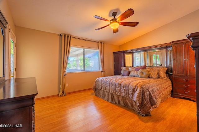 2335 Palo Verde Blvd N, Lake Havasu City, AZ 86404 - bedroom featuring light wood-style flooring, lofted ceiling, baseboards, and a ceiling fan