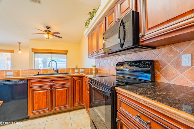 2335 Palo Verde Blvd N, Lake Havasu City, AZ 86404 - kitchen featuring black appliances, brown cabinets, decorative backsplash, and light tile patterned floors
