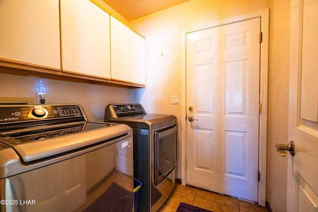 2335 Palo Verde Blvd N, Lake Havasu City, AZ 86404 - laundry room featuring cabinet space, washer and clothes dryer, and light tile patterned flooring
