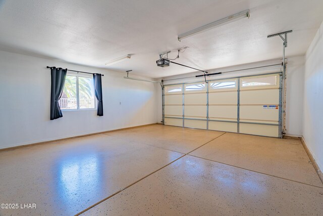 2335 Palo Verde Blvd N, Lake Havasu City, AZ 86404 - garage featuring a garage door opener and baseboards