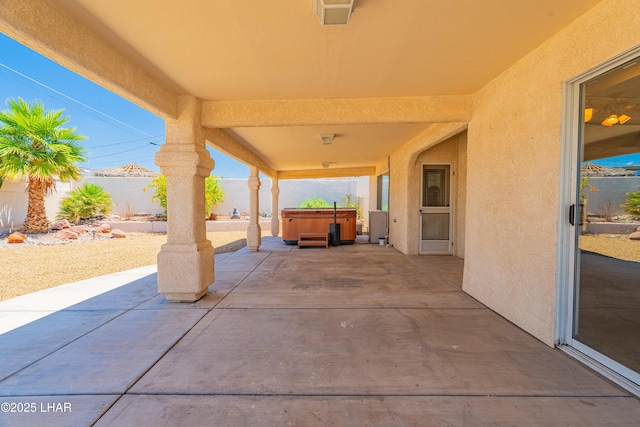 2335 Palo Verde Blvd N, Lake Havasu City, AZ 86404 - view of patio featuring a hot tub and a fenced backyard
