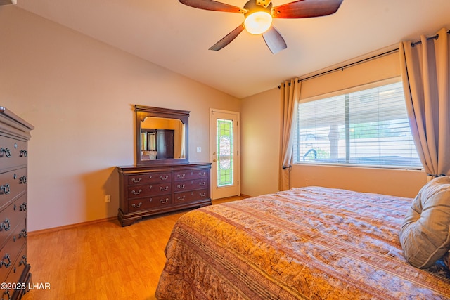 2335 Palo Verde Blvd N, Lake Havasu City, AZ 86404 - bedroom featuring lofted ceiling, light wood-style flooring, a ceiling fan, and baseboards