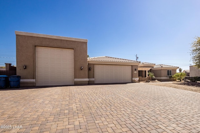 view of front of property with a garage