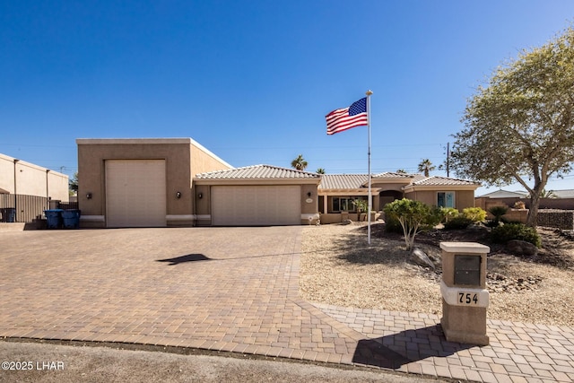 view of front of home featuring a garage