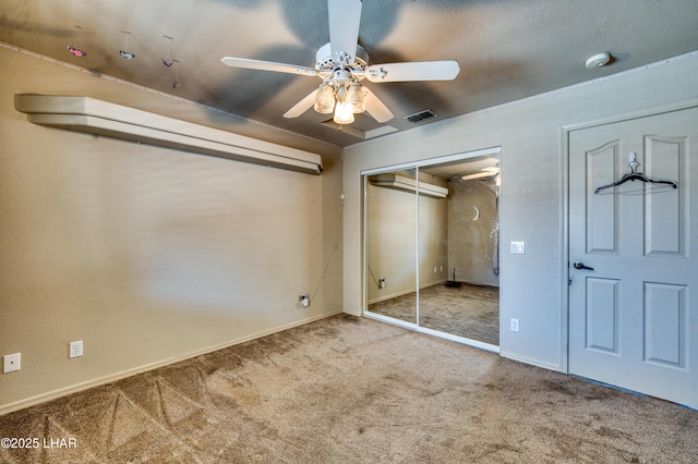 3000 Mirage Dr, Lake Havasu City, AZ 86404 - unfurnished bedroom featuring carpet flooring, a closet, a ceiling fan, and baseboards