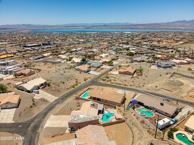 3000 Mirage Dr, Lake Havasu City, AZ 86404 - aerial perspective of suburban area with a pool area and a water and mountain view