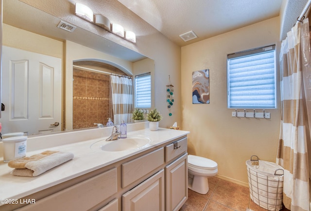 3000 Mirage Dr, Lake Havasu City, AZ 86404 - bathroom featuring toilet, vanity, tile patterned floors, and a shower with shower curtain