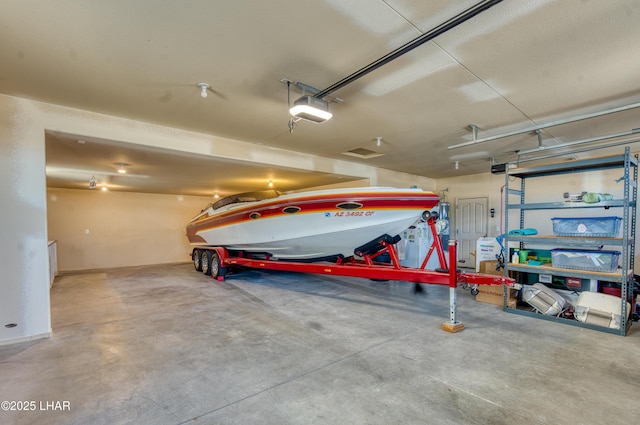 3000 Mirage Dr, Lake Havasu City, AZ 86404 - garage with a garage door opener and baseboards
