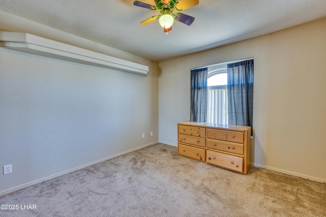 3000 Mirage Dr, Lake Havasu City, AZ 86404 - unfurnished bedroom featuring light colored carpet, ceiling fan, and baseboards